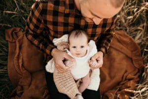 Andrew and his new baby.